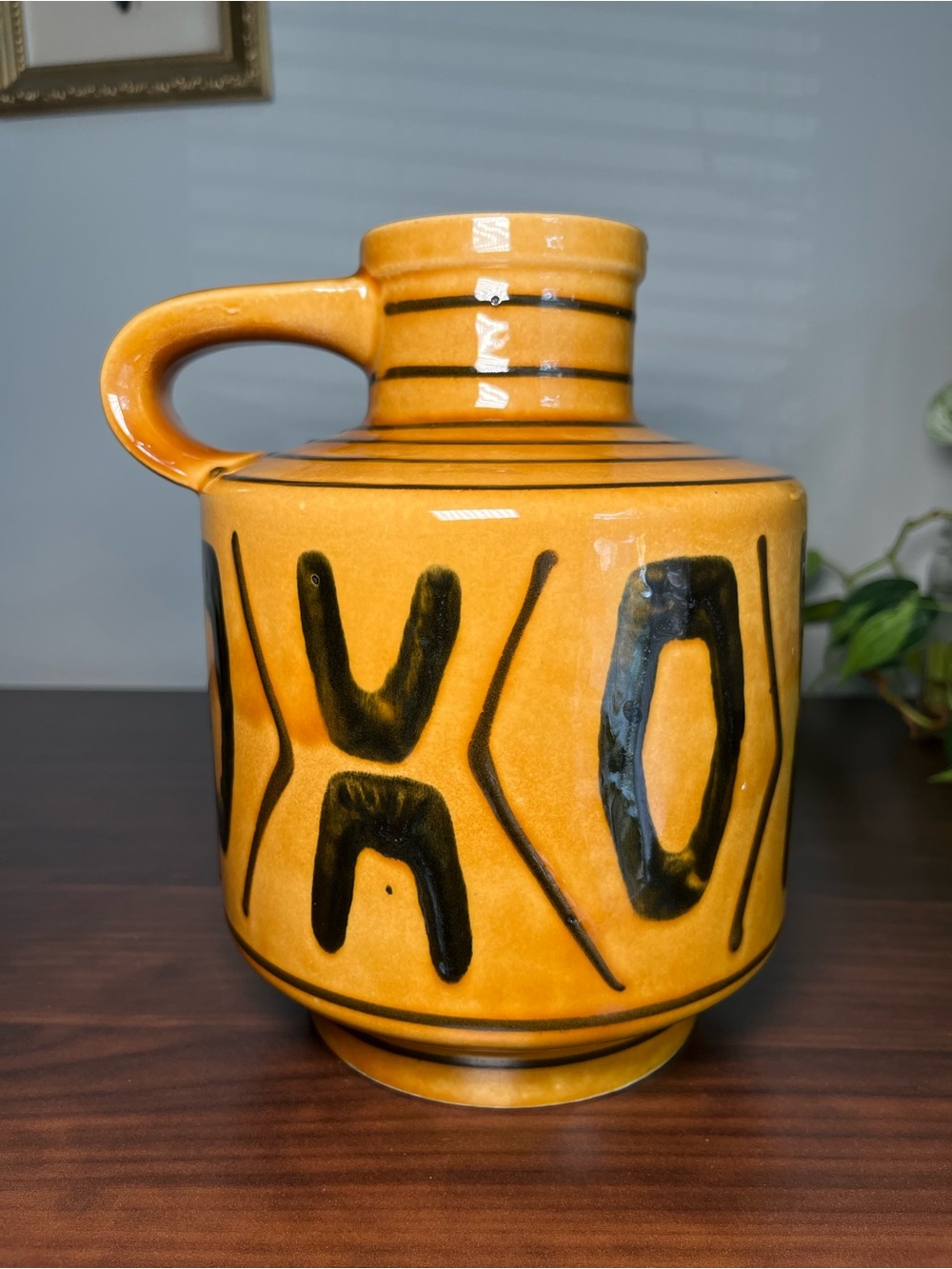 West Germany ceramic jug with orange-brown glaze and black abstract designs 60’s